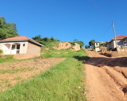 100x100ft Plot for Sale in Buloba with Small House